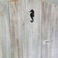 55" tall wood beach headboard with seahorse detail